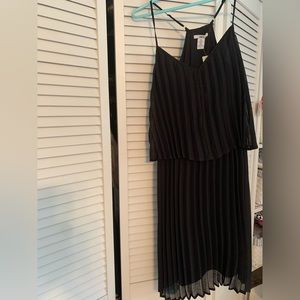 Pleated black cocktail dress